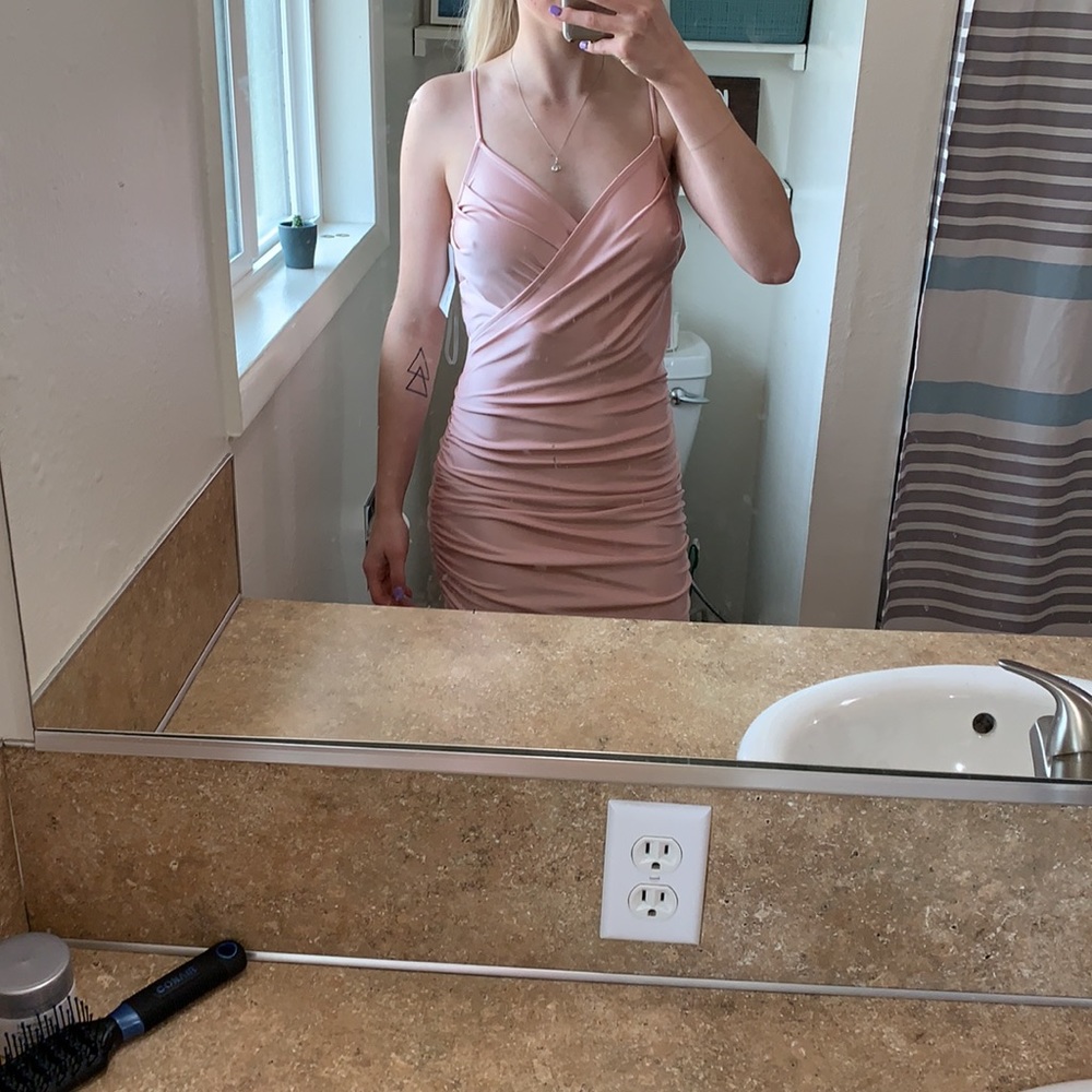 Size S tight fitting West End Boutique pink dress
